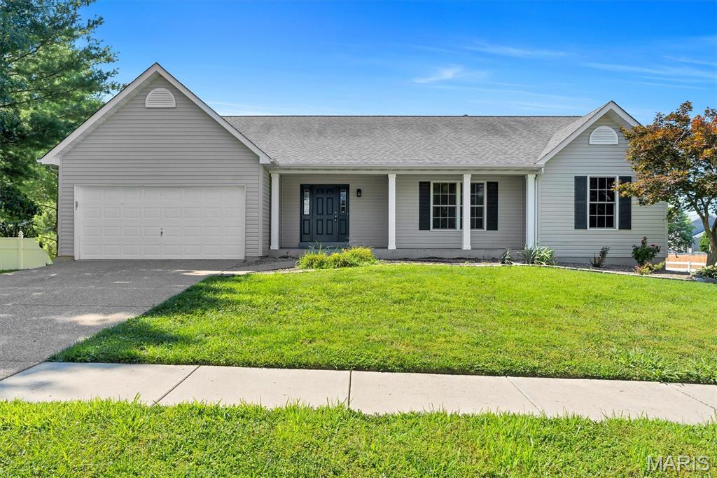 Beautifully updated 4-bedroom, 3-bath ranch in the Villages at Dardenne, offering bright, open living and a thoughtfully finished walkout lower level. Step inside to luxury vinyl plank flooring, vaulted ceilings, and a spacious living room that flows seamlessly into the sunny breakfast room and kitchen. The kitchen features stainless steel appliances, a pantry, and an easy connection to the main living areas — perfect for everyday living and entertaining.

The main level includes three bedrooms, including a generous primary suite with a walk-in closet and private bath. 

The finished walkout lower level expands your living space with a large recreation room, media room, exercise room, a fourth bedroom, full bath, and dedicated storage.

Situated on a corner lot with an attached 2-car garage, this home also provides access to neighborhood amenities including a community pool and tennis courts. With updated finishes, spacious rooms, and a flexible lower level, this home offers comfort, convenience, and room to grow.