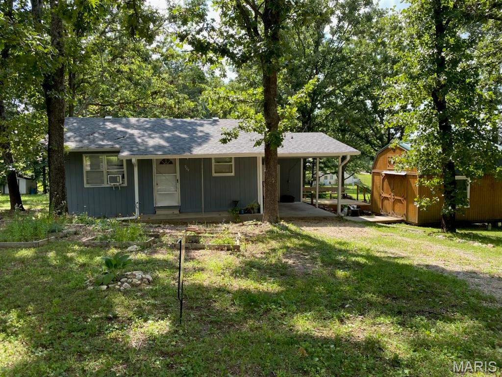 Charming 2-Bedroom Home with Guest House/Office Well-maintained 2-bedroom, 1-bath home featuring newer hardwood floors, updated electrical, and a remodeled bathroom with a newer shower/tub combination. The kitchen comes complete with appliances, making this home move-in ready. Outside, you'll find a versatile 12' x 16' guest house or office space that has been insulated, wired for electricity, and includes a composting toilet--perfect for a home office, studio, hobby space, or guest accommodations. Newer roof with architectural shingles, gutters, and downspouts - done at the end of 2023. Additional storage is available in the 10' x 12' metal shed, ideal for lawn equipment and gardening tools. The property boasts attractive landscaping and has been meticulously cared for, offering both comfort and curb appeal. Listed at $109,900 This property combines functionality, charm, and value--don't miss the opportunity to make it yours!