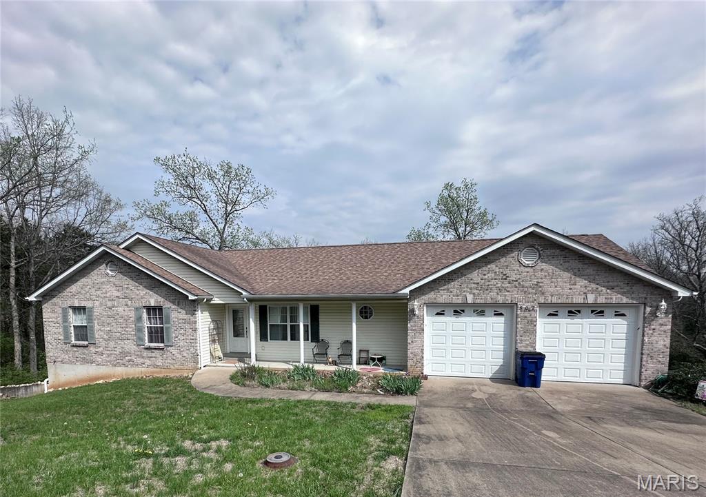 Discover a harmonious blend of comfort and style at 802 Donaldson ST, DeSoto MO 63020. Built in 2005, this single-family residence presents an attractive property in great condition, offering an exceptional opportunity for a fulfilling lifestyle. This ranch-style home features three inviting bedrooms, providing ample space for relaxation and personal retreats. The living room, dining and kitchen boast of an open floor plan. Two well-appointed bathrooms offer convenience and comfort for residents and guests alike. An attached oversized garage(approximate 23'x31') provides secure parking and additional storage space, while a welcoming porch offers a charming space to enjoy the outdoors.  Just off of the kitchen is the laundry room equipped with a pocket door. The walk out basement is a blank canvas waiting for the perfect touches to make it your own space. A new heat pump system installed in 2025 takes care of those HVAC needs. The home is surrounded by woods on two sides for a quiet tranquil feel. A creek for exploring runs behind and at the edge of the property. This home is located in a quiet neighborhood with in minutes of all kinds of amentities including dining, shopping, several parks and much more. Located in the city limits of DeSoto this property offers great history, heritage and a community feel to it.  Embrace the chance to experience this remarkable property firsthand; schedule your private viewing today.