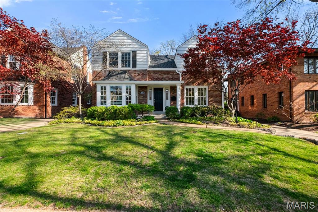 A rare opportunity to own a beautifully renovated home in Clayton Gardens, offering a clean, crisp aesthetic with a subtle coastal chic energy throughout. Over 2640 sq feet of thoughtfully updated and truly intentional design, this home features beautiful refinished hardwood floors, a new roof, new gutters, a new water heater, and fresh landscaping—providing both style and peace of mind. The open floor plan is ideal for entertaining, with seamless flow and connected living spaces that still honor the timeless character of its classic design.

The main level includes a spacious living room, family room, formal dining room, and butler’s pantry, along with a light-filled kitchen that is both functional and inviting. The kitchen boasts an abundance of cabinetry, granite countertops, stainless steel appliances, and a large center island. Expansive High end windows flood the space with natural light and overlook the private, serene backyard. Just off the family room, enjoy indoor/outdoor living on the 3 season porch w/ fireplace/stove to warm you on cool days and nights.  Walk out to large deck and nice private yard. The kitchen flows effortlessly into the elegant formal dining room through a convenient butler’s pantry with additional counter space and storage.

Upstairs, you’ll find three spacious bedrooms, including a generous primary suite with an updated bath and two large walk-in closets. A second-floor laundry room and an updated hall bath add everyday convenience.

The finished lower level offers even more living space ( approx 400+ sq ft), complete with egress windows, a full bath, and ample storage. There is additional unfinished space in the LL that could easily be finished. 

Outside, fresh landscaping including automated night lighting and an irrigation system enhance the property, while a large two-car detached garage completes the home. Enjoy all that Clayton has to offer—just moments from everything, yet tucked away in a charming, neighborly setting.

Truly well-done and completely move-in ready.