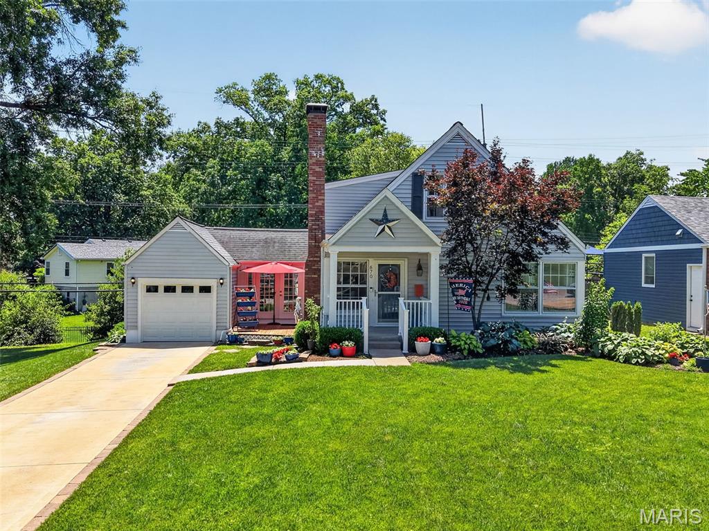 Charming Kirkwood cottage full of character and warmth! This 3-bedroom, 2-bath home offers 1,656 square feet of inviting living space with timeless appeal and modern conveniences. Step inside to find beautiful wood flooring, a spacious living room centered around a cozy gas fireplace, and abundant natural light throughout.

The thoughtfully designed floor plan features two main-level bedrooms and a private upper-level primary suite, creating flexible living arrangements for a variety of lifestyles. The kitchen is equipped with stainless steel appliances, Caesarstone Quartz countertops, custom backsplash, and luxury vinyl plank flooring. The adjoining flex space can easily serve as a dining room, home office, sitting area, playroom, or a combination of a few.

Step outside to enjoy a beautifully maintained gardening space alongside an open backyard area, offering the perfect balance of charm, relaxation, and room for outdoor entertaining. The walk-out basement offers excellent storage and future finishing potential, while the attached one-car garage and driveway provide convenient parking.

Located within the highly rated Kirkwood School District and just minutes from shopping, dining, parks, and all that Kirkwood has to offer, this charming home blends comfort, character, and location into one exceptional opportunity. Don't miss your chance to make this Kirkwood gem your own! Some notable updates include: kitchen and dining room remodel (2022), asphalt removed and replaced with concrete driveway (2018), added stainless steel appliances (2015), converted wood burning fireplace to gas (2015), replaced carpeting upstairs and replaced main floor bathroom flooring (2021), partial remodel of main floor bathroom (2021), and installed new furnace (2016).