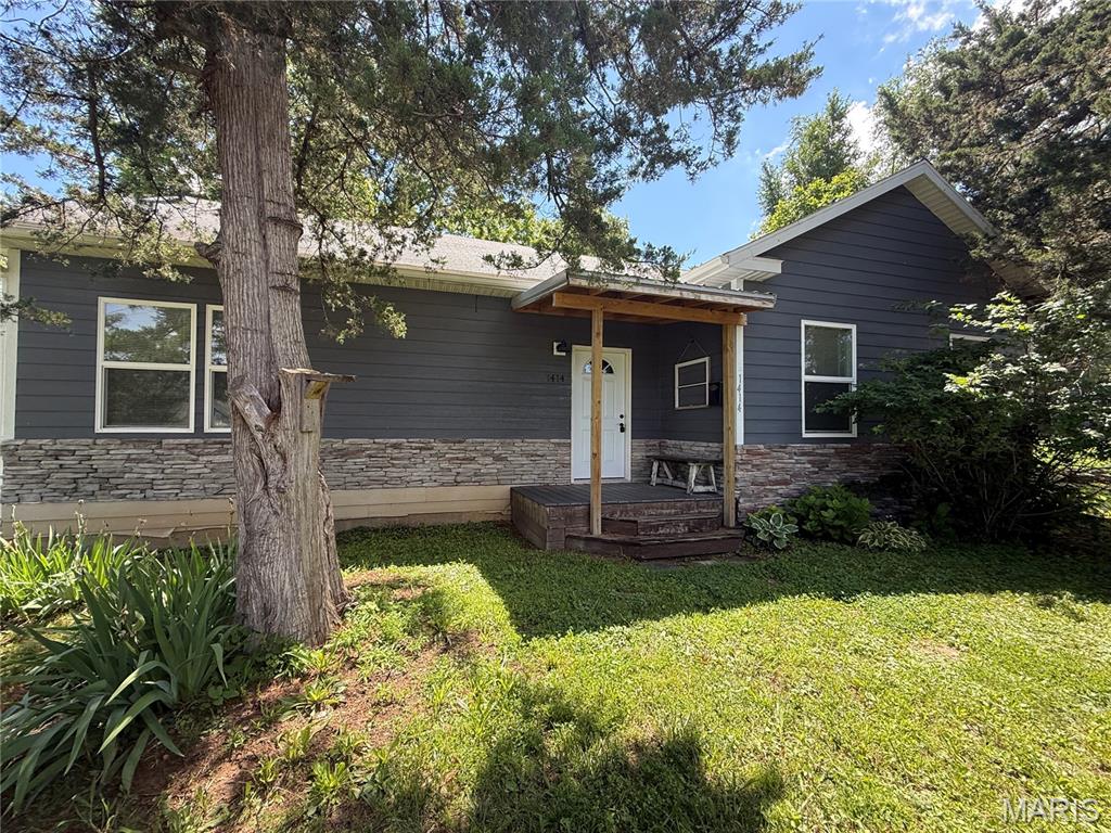 Welcome to this three bedroom and one and a half bathroom home. Home has a large living room, kitchen , dining room, and pantry. Kitchen has wood cabinets, an island, and appliances stay. Enjoy the outdoors from the front porch or the back deck. There is off street parking in the alley. Large storage shed is also behind the house. Home has crawl space.