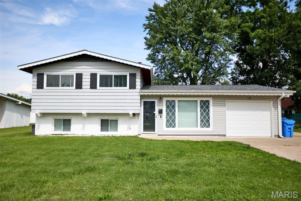 This adorable split-level home effortlessly combines style, space, and functionality, making it a must-see property. Featuring 3 comfortable bedrooms and 2 full bathrooms, the residence welcomes you inside with beautiful hardwood floors that flow seamlessly throughout the entire layout. The smart split-level design offers excellent separation of space, while the exterior boasts a spacious backyard perfect for outdoor entertaining, gardening, or relaxing. Complete with a convenient 1 car garage and ample additional parking space for guests, this charming home delivers everything you need for comfortable living. Schedule your showing today!