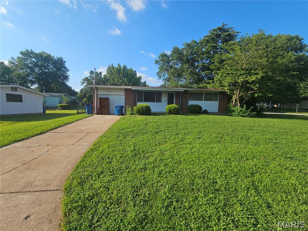 Welcome to this charming 3-bedroom, 1-bath home offering a comfortable and functional layout designed for everyday living. The bright and inviting living area provides a welcoming space to relax, while the spacious kitchen offers ample cabinet and counter space for meal preparation and entertaining. Three well-sized bedrooms provide flexibility for a home office, hobby room, or additional living needs. Step outside to enjoy the backyard with plenty of room for gardening, outdoor activities, or simply unwinding. Conveniently located near parks, shopping, dining, schools, and major highways, this home offers the perfect combination of comfort, convenience, and accessibility in an established St. Louis neighborhood.