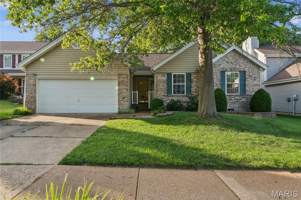 Showings start 7/16/26 PM...Rockwood schools and so much more!  Tucked away in a peaceful, walkable neighborhood with tree-lined streets on a cul-de-sac, this charming Wildwood ranch home features 3BR, 2 full baths PLUS bonus room on main floor could be used as an extra sleeping space or office.  With a little TLC it’s a blank canvas but move in ready with a brand new roof and skylights (June 2026).  In addition to the new skylights, the light filled great room features a gas fireplace, vaulted ceiling and gleaming hardwood floors.  The kitchen features tile flooring, ample cabinets, a pantry, SS electric range and entry from the garage, convenient for bringing in groceries.  Open kitchen to the dining area is separated by a breakfast bar with additional seating and features bay windows and more beautiful hardwood floors.  Another bonus is the main floor hall laundry close to the bedrooms, making laundry day a breeze!
The primary bedroom features neutral carpeting, a walk-in closet, ensuite bath complete with tile flooring, a soaker tub and walk in tile shower. A guest hall, full bath (tub/shower combo) and two more ample sized bedrooms round out the main level. Spacious fenced and level backyard with screened in porch provides a lovely space for outdoor entertaining.  There is also an irrigation system so you can keep your grass green all summer!  Enjoy summers at your choice of two neighborhood pools, one complete with a playground and within walking distance. Also within walking distance to Wildwood Town Center, concerts, restaurants, shopping, farmer’s market, and a movie theater.  Finished LL adds more potential to personalize, add additional living space and instant equity.  Welcome home!