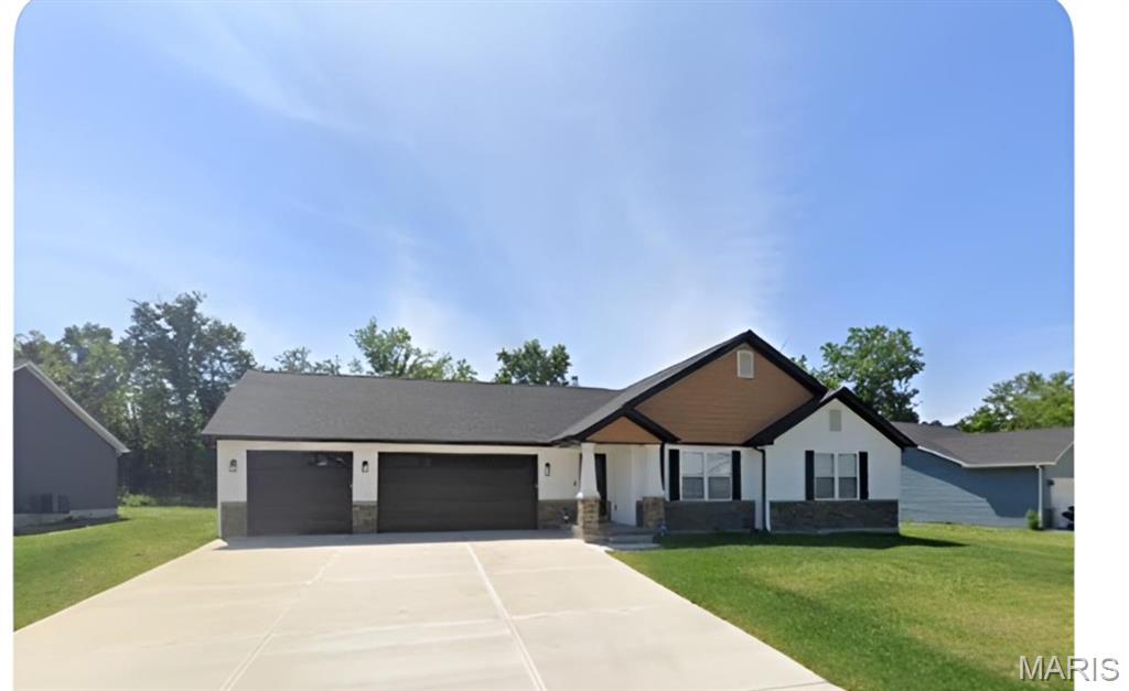 This home is a to-be-built home. 1555 sq ft ranch home with 3 bedrooms and 2 bathrooms, full basement, and 2 car attached garage. The picture is for reference only.
