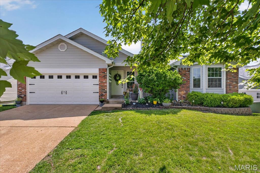 Open House 6/13 12-2pm * Welcome home to this beautifully updated ranch in the heart of Ballwin. A lush, landscaped yard and covered front porch set the tone before you even step inside. The sun-filled living room features rich hardwood floors and a wood-burning fireplace, creating a warm and inviting gathering space. The updated kitchen features white shaker cabinets, granite countertops, and stainless steel appliances. A dining area off the kitchen with sliding glass doors opening directly onto the deck make indoor-outdoor entertaining effortless. The primary suite offers a private ensuite bath and bay window perfect for a reading nook. Two additional bedrooms and an updated full bath complete the main level. Head downstairs and discover even more room to live. The finished basement offers a generous family room plus a versatile bonus room, ideal for a home office, gym, or playroom. Outside, a deck built for entertaining overlooks a fully fenced backyard. New roof, siding, gutters, and fascia (2025). Located in an award-winning school district. Move-in ready and waiting for you!