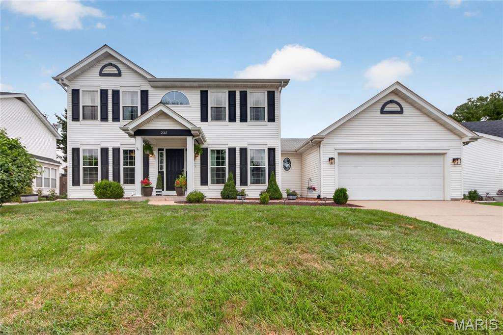 Welcome home to this beautifully maintained 2-story in desirable O’Fallon and the Ft. Zumwalt School District! Warm, inviting, and full of space to spread out, this home offers the perfect blend of comfort, style, and everyday convenience. Step inside to beautiful wood flooring throughout the main level, featuring a separate dining room, living room, spacious great room, and a large kitchen ready for entertaining.

The great room is filled with natural light from the charming bay window and opens through an atrium door to the patio and fully fenced, level backyard—ideal for relaxing, entertaining, or enjoying the beautifully manicured lawn. The kitchen is sure to impress with stainless steel appliances, refrigerator included, newer granite countertops, center island with breakfast bar, pantry, and abundant cabinet space. Main-floor laundry and a central vacuum system add even more convenience.

Upstairs, the generously sized primary suite offers a walk-in closet and private en-suite bath with separate shower and tub. Two additional bedrooms, a full hall bath, and a large linen closet complete the second floor. The partially finished lower level expands your living space with a 23 x 18 recreation room, plus plenty of additional storage. An oversized 2-car garage, sprinkler system, and fantastic location near common ground, Highway 364, shopping, restaurants, and parks make this home a must-see! Notable 2021 updates include windows, kitchen countertops, carpeting, water heater, furnace, and sump pump.
