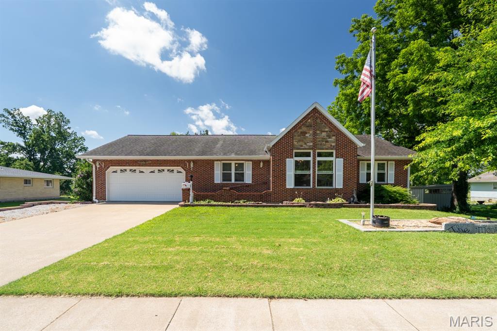 Welcome to 1153 Edgemont Blvd in Perryville, where comfort, updates, and functionality come together in one attractive package. Thoughtfully updated just a few years ago, this home offers a move-in ready interior with modern touches while maintaining the warmth and character that make it feel like home.

Step inside to discover inviting living spaces, updated finishes, and a functional layout designed for both everyday living and entertaining. Natural light fills the home, creating a bright and welcoming atmosphere throughout.

One of the property's standout features is the impressive oversized detached garage/shop. Whether you need space for vehicles, equipment, hobbies, a workshop, or additional storage, this versatile building offers endless possibilities and is a rare find in today's market.

Outside, you'll find plenty of room to enjoy the outdoors, host gatherings, or simply relax and unwind. Conveniently located in the heart of Perryville, this well-maintained property combines small-town charm with practical amenities that are hard to come by.

Don't miss your opportunity to make this exceptional property your next home. Schedule your private showing today!