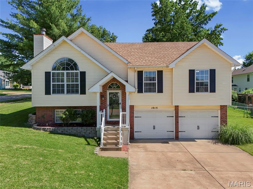 Welcome home to 1015 Thames Dr! This beautiful split-level home offers four bedrooms and two full baths in the Windsor district, with all Windsor schools less than a five minute drive away, and just a half mile from Highway 55 for an easy commute! The spacious living room, dining room and kitchen are filled with amazing natural light, and a cozy wood-burning fireplace makes this home perfect for relaxing evenings in. Situated on a nice big corner lot, the level, fenced backyard with a stamped patio is perfect for relaxing or entertaining. This one has a new roof--only 1 year old! The lower level even has a bonus room-perfect for a home office, a home gym or additional storage space which is hard to find in a split level home! Just about a mile away, you’ll find the quaint and charming historic town of Kimmswick. Grab a slice of the Blue Owl Restaurant & Bakery’s award-winning, levee-high apple pie (or the carrot cake — a personal favorite!), stop by The Dough Depot for a sandwich on their amazing pretzel bread, sip a specialty dirty soda now that Sodie Specialty Drinks has arrived in town, or treat yourself at Behold Coffee or Cafe Franchise & Creperie. For date night, La Chance Winery & Restaurant is a must — live music, wine flights, and a beautiful outdoor patio, all close to home! Come take a look at this amazing house, then head over to Kimmswick for the Father’s Day car show! Showings start Friday, June 19th.