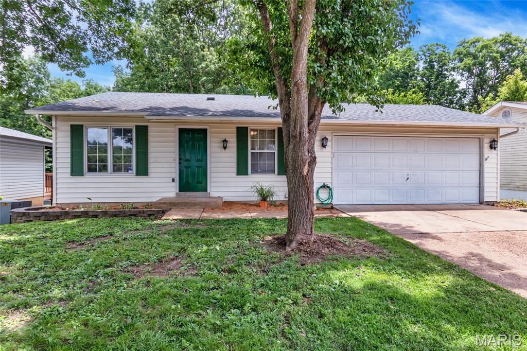 Enjoy the perfect combination of location, updates, and outdoor living in this Eureka home situated within the sought-after Rockwood School District. Fresh paint and recently installed carpeting provide a move-in ready interior. The eat-in kitchen features tile flooring, wood cabinetry, and space for a dining table, while the adjoining living room offers a comfortable gathering space. Three bedrooms and a full hall bath complete the main level. The walkout lower level expands the living area with a spacious family room, wet bar, full bath, and office area, providing flexibility for entertaining, working from home, or everyday living. Enjoy the private backyard setting that backs to wooded neighborhood common ground, with two large decks and a patio offering plenty of space to relax and enjoy nature. An oversized two-car garage provides additional storage. Don't miss this opportunity to own a move-in ready home in a fantastic Eureka location! Showings begin July 8th.