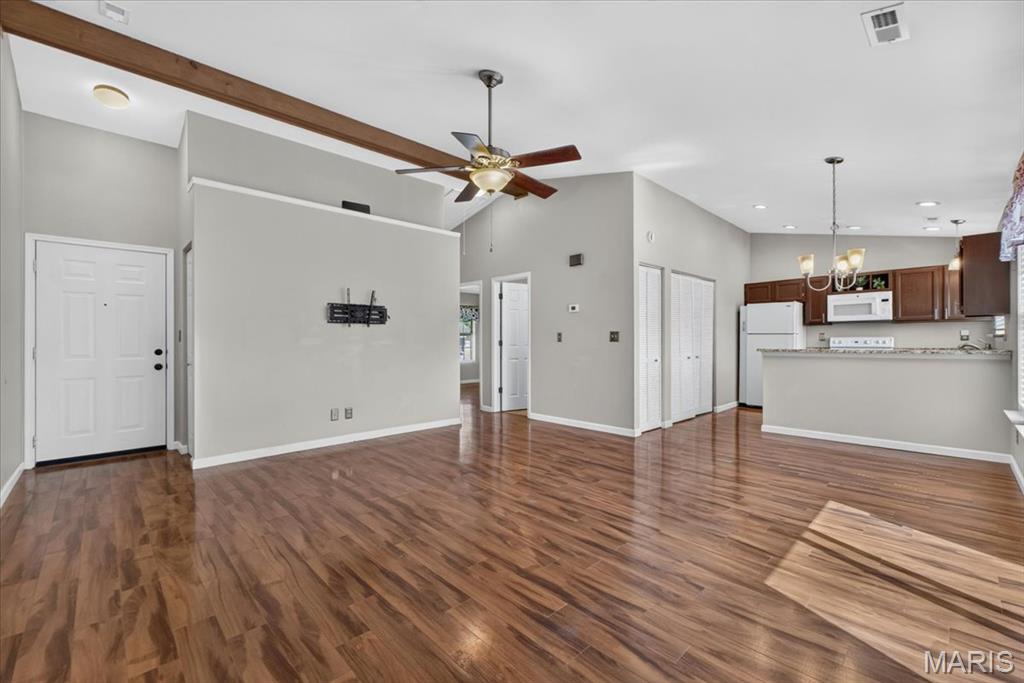 Beautifully updated 2-Bedroom, 2-Bath 2nd floor condo in the Sugarwood Condo Association. Escape the heat and take advantage of the included community pool and pavilion area. Inside, you'll find a bright and open floor plan with luxury plank flooring throughout the main common areas, soaring high vaulted ceilings, recessed can-lighting and gorgeous views off the NEWER DECK and balcony with large built in storage closet. The kitchen has solid refinished wood cabinetry, granite counter-tops, breakfast bar, pantry, and convenient in-unit laundry. The primary bedroom has large a closet with built-in shelving for added organization, full en-suite bath with newer fixtures and stand-up shower. A second bedroom and additional full bath round out this move-in ready condo and a fantastic price. Other recent updates include: Roof in 2022, Deck and balcony in 2025, and electric panel in 2023. This home was has 2 assigned parking spots including one covered space right outside the condo. The condo association includes a large pool, pavilion area, basketball court, and the low monthly fee covers water, sewer, trash, and partial insurance. Enjoy maintenance free living in this well-priced and move-in ready condo.