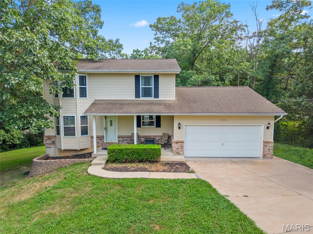 Welcome home to this spacious two-story home offering 3 bedrooms, 4 bathrooms, and an additional bonus room that would make the perfect home office, guest room, or extra sleeping area. Designed with both comfort and functionality in mind, this home offers plenty of space for everyday living and entertaining.

Inside, you'll find newer flooring throughout select areas of the home, adding a fresh, updated feel. The convenient main-floor laundry makes daily chores a breeze, while the finished basement provides additional living space that's perfect for a family room, game room, home gym, or whatever best fits your lifestyle.

Step outside onto the back deck and take in the gorgeous views—an ideal spot to enjoy your morning coffee, unwind after a long day, or entertain. The attached two-car garage provides ample space for parking and storage, adding even more convenience to this well-appointed home.

With its flexible floor plan, spacious layout, and thoughtful updates, this Cedar Hill home is ready for its next owners to move in and make it their own.