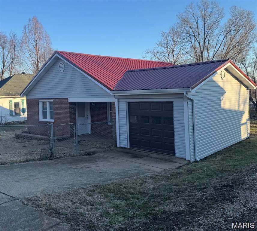 Beautiful newly remodeled 3 bedroom home with garage.. .large open floor plan...many new features including new siding, new roof, new central AC, new flooring, new electric, new bathroom, new kitchen, new lighting, new hot water heater, etc....new deck, large back yard with alley access... fenced in yard in front with sidewalk.... move in ready