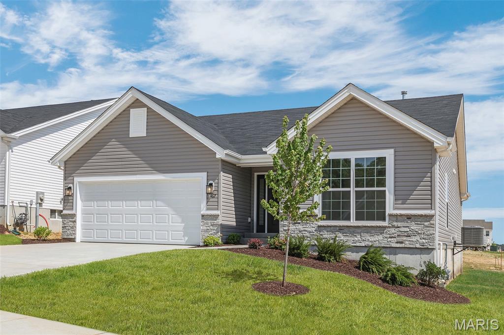 New McBride Homes Aspen ranch 3 BR & 2 BA, is move-in ready now! Open floor plan with vaulted ceilings, great room with a ceiling fan & wood laminate flooring in the main living areas. Kitchen features level 4 Benton Sarsaparilla 42” cabinets, quartz countertops, peninsula w/flush breakfast bar, & stainless GE appliances. Primary suite offers walk-in closet & private bath w/double vanity & 5’ walk-in shower. Two additional bedrooms & full bath add convenience. Extras include 6’ windows, ceiling fan prewires, main floor laundry, coach lights, & white 2-panel doors. LL has ¾ bath rough-in for future finish. Nestled in Truesdale right outside Warrenton, Elkhorn Ridge is in one of the most highly sought-after areas in Warren County. The neighborhood is also just minutes away from shopping, restaurants, grocery stores, and more. Enjoy peace of mind with McBride Homes’ 10 year builders warranty and incredible customer service! Similar photos shown.