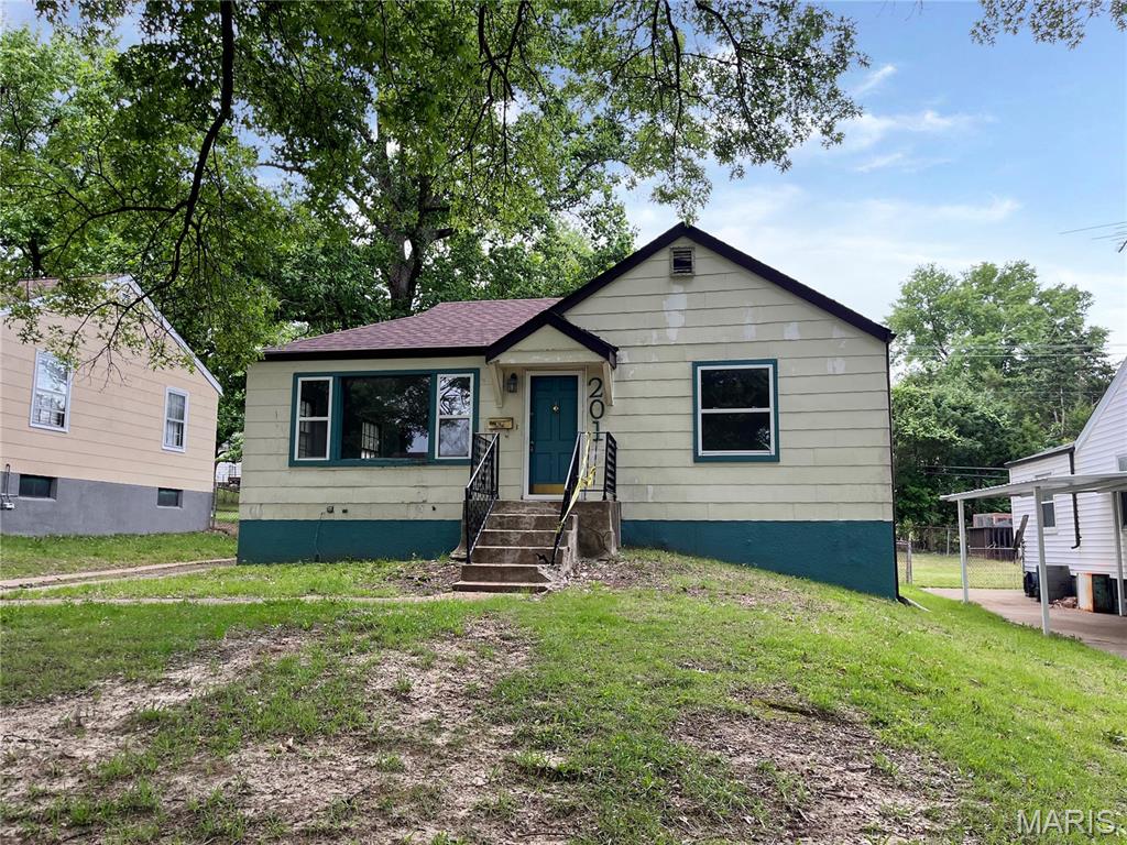 This bungalow offers solid bones and genuine potential with 3 bedrooms and 1 bathroom. The property sits on a lot with room to work, anchored by a full basement that expands usable space and storage capacity.

Off-street parking is available, a practical asset for residents or investors. Inside, a sunroom provides flexible space for living, work, or seasonal use. A large backyard offers outdoor space for expansion, recreation, or tenant amenities. The established St. Louis neighborhood location adds to the property's appeal.

The structure and layout form a foundation for renovation, owner-occupancy, or rental development. This is an opportunity to acquire property with tangible features and upside potential.

Schedule a showing to evaluate the property firsthand and envision your next steps.

This is a Fannie Mae HomePath property.

First Time Buyers, complete the HomePath Ready Buyer homeownership course on Homepath. Attach certificate to offer up to 3% closing cost assistance. Check HomePath for more details. Restrictions apply.