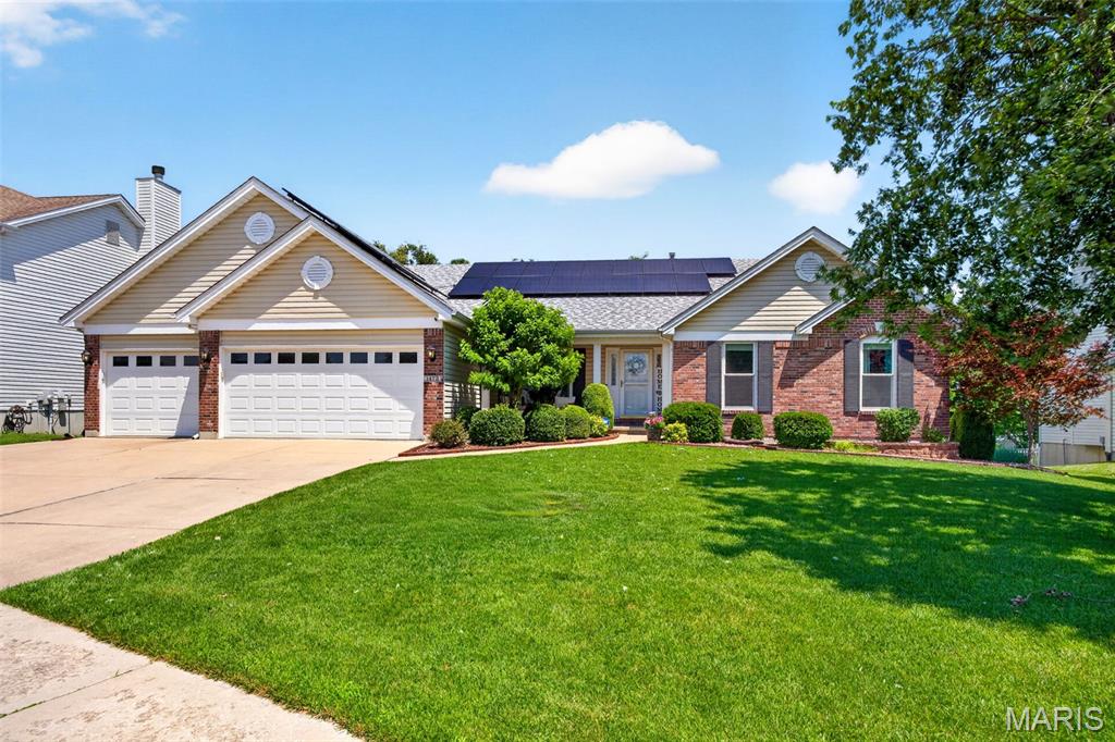 Stunning Updated Ranch Home with 4 Bedrooms, 3 Baths, and a 3-Car Garage! Welcome to this exceptional move-in-ready ranch offering the perfect blend of luxury, comfort, and modern design. From the moment you enter, you'll appreciate the open-concept floor plan, premium finishes, and meticulous updates throughout. The heart of the home is the chef's dream kitchen, featuring custom cabinetry, a massive center island with quartz countertops and a dramatic waterfall edge, high-end stainless appliances, abundant storage, and ample space for all. The vaulted great room features a cozy gas fireplace and flows seamlessly into the formal dining room and to the outdoor living area, creating the ideal setting for entertaining and gatherings. Retreat to the beautifully finished walkout lower level, providing additional living space, recreation areas, guest accommodations, and endless possibilities for work or play. New top-of-the-line luxury vinyl plank flooring and plush carpeting throughout add style, durability, and warmth. Step outside to enjoy the low-maintenance composite deck overlooking the fully fenced backyard with lush, mature tree line—perfect for outdoor entertaining and relaxing evenings.
Additional highlights include:
• Owned solar panels for extremely low energy bills
• 3-car garage
• Finished walkout LL
• Custom kitchen cabinetry
• Quartz countertops with waterfall island
• Open floor plan
• Top-of-the-line luxury vinyl plank flooring
• Newer carpet, paint & lighting throughout
• Brand-new windows and sliding glass door (2025)
• Lennox HVAC system replaced in 2018 (Main floor unit)
• 50-gallon water heater replaced in 2018
• Fully fenced backyard with 6' vinyl for privacy
• Low-maintenance composite deck
• Abundant storage
• Move-in ready condition
Ideally located in the highly sought after Fort Zumwalt West school district and close to shopping, dining, parks, schools, and major commuter routes, this beautifully updated ranch offers the lifestyle today's buyers are searching for. Schedule your private showing today!