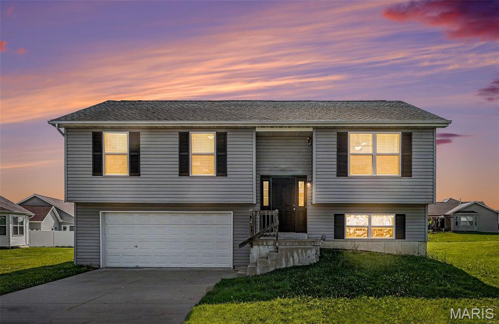 Welcome home to this beautifully updated 3-bedroom, 2-bath split-level in the desirable Shire subdivision! This move-in ready home offers a spacious and functional floor plan with a bright living area filled with natural light, an updated kitchen featuring ample cabinetry and counter space, and comfortable bedrooms with generous closet space.
The unfinished lower level provides excellent potential for additional living space, recreation area, home gym, workshop, or abundant storage. The oversized tuck-under two-car garage offers plenty of room for vehicles, storage, hobbies, or workshop space.
Enjoy the outdoors in the level backyard, perfect for relaxing, entertaining, or play. Conveniently located near I-70, schools, parks, shopping, and dining, this home offers the perfect blend of small-town charm and commuter convenience.