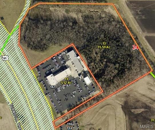 Prime Commercial Opportunity! 16.5 total acres–will divide to suit your needs, city water and sewer available, $5.00 per square foot. 16.5 Acres with Highway 61 visibility and convenient access directly off the service road. Located in a fast-growing area just 45 minutes from St. Louis, this site offers the perfect balance of accessibility, exposure, and growth potential.  Strong traffic counts and expanding commercial development nearby. This versatile property is ideal for retail, service, office, warehouse, or mixed-use development.