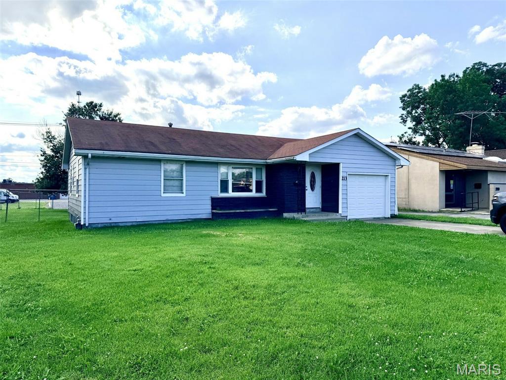 1,172 SF flex space suitable for day care operation, office, or other professional service use, located a few blocks from N. Kinsghighway and Independence St. across from Cape Girardeau Junior High School.  Large reception area with threee private offices, kitchenette, and full basement for storage.  Zoned M-1.  Lease for just $1,500 per month!