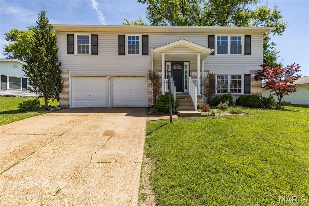 Welcome home to desirable Towne South Estates! Situated on a spacious corner lot, this 4 bedroom, 2 full bath home offers updates, functionality, and room to spread out. The updated kitchen features stainless steel appliances, ample cabinetry, and flows seamlessly into the main living spaces with neutral paint and 6-panel doors throughout. The primary suite includes a private full bath for added comfort.
The finished lower level offers a dedicated laundry area, 5th bedroom potential (needs door & closet), lots of additional storage space, updated systems, tankless water heater, and walk-out access to the lower patio—perfect for entertaining or relaxing. The oversized garage includes insulated doors and extra storage space for hobbies or projects. Step outside to enjoy the fully fenced backyard with plenty of room for pets, play, or gatherings. A well-maintained home with practical updates in a convenient location!