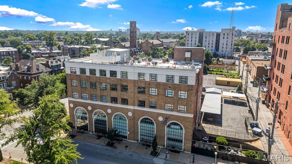Experience sophisticated urban living at the Maison Lofts, 4901 Washington AVE 3B, St. Louis, MO 63108. This 1929 light-filled loft-style condominium offers a unique blend of historic charm and contemporary convenience, providing an aspirational lifestyle in one of St. Louis's most desirable neighborhoods. The third-floor residence encompasses two thoughtfully designed bedrooms, each providing a private retreat. The two well-appointed bathrooms offer comfort and practicality for daily routines. The master bathroom suite has been updated for a spa-like experience in the comfort of your very own condo. This condo has an open floor plan with 10' ceilings, 42" cherry cabinets, granite countertops, stainless appliances, washer & dryer in the condo unit, and includes one assigned parking spot in the garage below the building, along with an elevator from the garage providing convenient access to your unit. Discover the potential of this meticulously maintained, exceptional property in a convenient location near Forest Park, BJC hospitals, and Washington University, with easy access to Downtown, Clayton, and the Delmar Loop within minutes. Schedule your private viewing and envision your future at this distinguished address. Welcome Home!