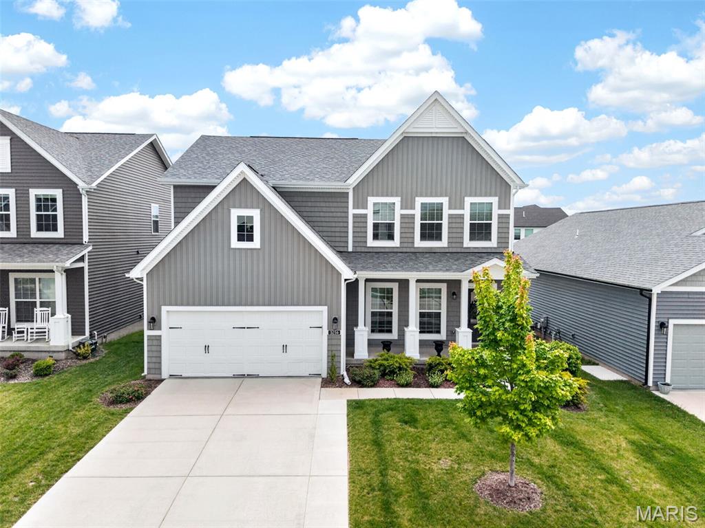 Welcome to life in New Town at St. Charles! This beautifully maintained home at 3256 River Breeze offers the perfect blend of charm, community, and convenience. Enjoy an immaculately landscaped yard with newly added fence, extended patio perfect for entertaining, and access to incredible amenities including lakes, canals, beaches, pools, pickleball courts, restaurants, parks, walking trails, sand volleyball, and a fitness center. Located in the fast-growing Orchard Farm School District, this home delivers the lifestyle you are searching for!