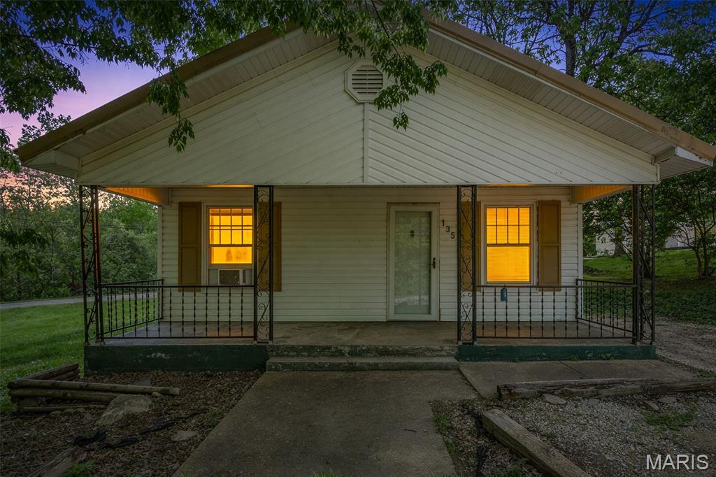 Charming and move-in ready, this beautifully updated 2-bedroom, 1-bath home offers an inviting open floor plan perfect for modern living. Enjoy relaxing mornings on the covered front porch or unwind on the back deck overlooking a large, spacious yard—ideal for entertaining or outdoor activities. Situated on a desirable corner lot near the city park, this property also features convenient alley access and a handy storage shed.  Inside, you’ll find a stylish new kitchen with solid surface countertops, an updated bathroom, and fresh flooring throughout, creating a clean and contemporary feel. A dedicated laundry room adds everyday convenience. With quick access to Hwy 32, commuting is a breeze while still enjoying a peaceful neighborhood setting.  This home combines comfort, updates, and location. Ready for you to move in and make it your own!