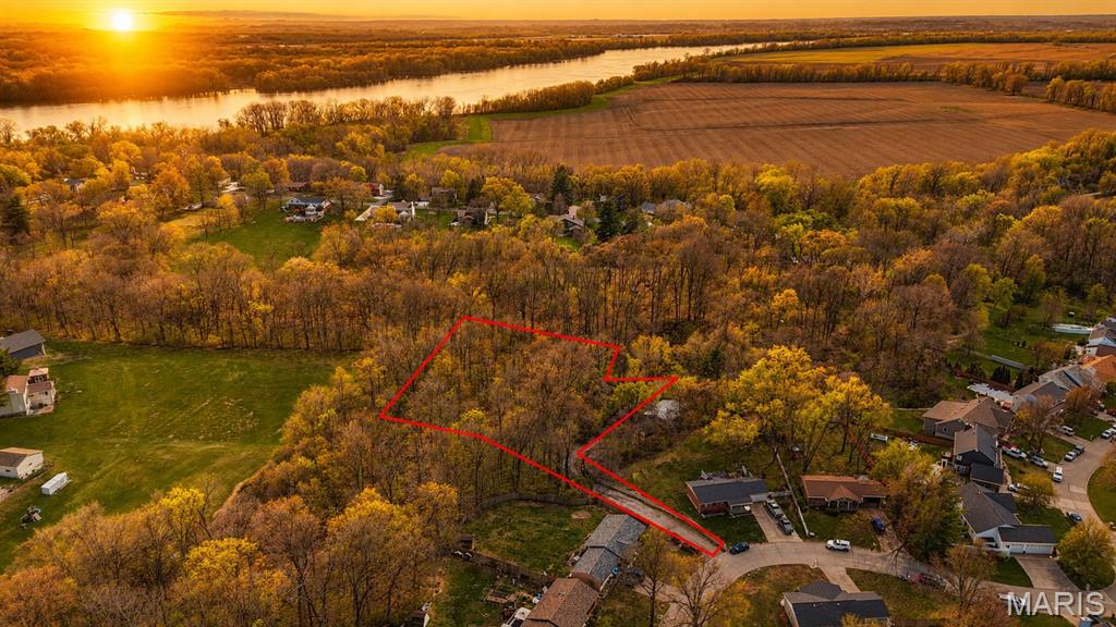 A full 1.3 acres of residential land in one of St. Charles County's most sought-after corners — priced to sell fast and ready for the custom home. Served by the highly-rated Francis Howell R-III School District Francis Howell North. Under 15 min to Historic Main Street St. Charles, ~20 min to downtown St. Louis, with quick access to I-70, Hwy 364, Hwy 94 & the 141 extension. Katy Trail, Missouri Riverfront,
Ameristar, Lindenwood University, and three hospitals within ~7 miles all close by. All City utilities , Electric and water connection at road. Bring your builder — land this size, in this district, at this price, won't last. Don't miss this opportunity to make your vision a reality on this expansive piece of land.
