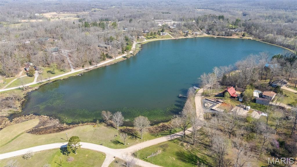 Build Your Dream Home at Lake Loch Loma! Discover the perfect blend of privacy, natural beauty, and convenience with this approximately 3/4 acre m/l lot located in the highly popular Lake Loch Loma subdivision. Tucked away at the end of a quiet dead-end road, this property offers a peaceful, park-like setting ideal for your future home. The land is partially cleared while still featuring mature wooded areas, providing the perfect balance of open space and natural privacy. A partial fence is already in place, adding to the usability and appeal of the property. Enjoy abundant wildlife, serene surroundings, and exclusive access to the private Lake Loch Loma, including full use of common areas and amenities. Whether you’re looking to build now or invest for the future, this property offers endless potential in one of the area’s most sought-after locations.