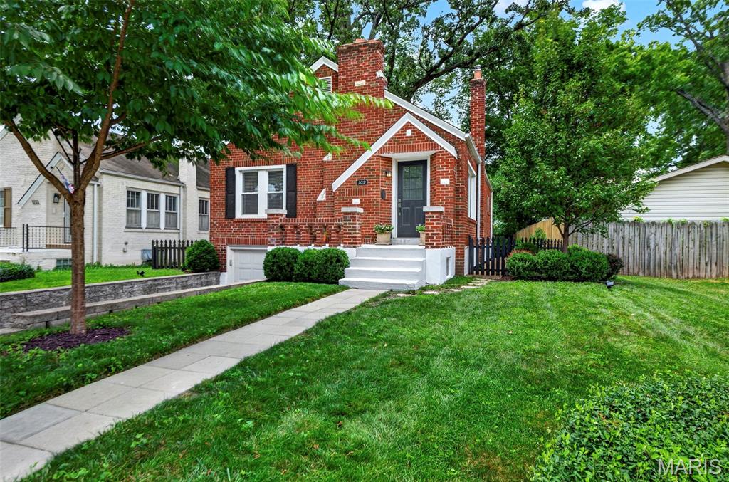 Charming Brick Bungalow in the Heart of Kirkwood

Welcome home to this charming brick bungalow nestled in the heart of Kirkwood's sought-after Jefferson-Argonne Historic District. Enjoy an unbeatable location just a short walk to downtown Kirkwood, the Farmers' Market, the Kirkwood Early Childhood Center, and just one block from Mitchell Park.

Inside, you'll find beautiful hardwood floors throughout, an open-concept kitchen with abundant counter space, and a built-in period hutch that adds timeless character while providing convenient dry food storage. The home also features an updated bathroom, stylish lighting fixtures, and a fresh, modern paint palette. Two spacious main-floor bedrooms offer comfortable living while preserving the home's classic bungalow charm.

Outside, mature trees and landscaping create a picturesque setting, while the fully fenced backyard provides the perfect space for entertaining, gardening, pets, or simply relaxing.

With its blend of historic character, thoughtful updates, functional living spaces, and an exceptional walkable location, this home is a rare opportunity to enjoy the very best of Kirkwood living.

Highlights:

Charming brick bungalow in the Jefferson-Argonne Historic District
Walking distance to downtown Kirkwood, the Farmers' Market, and the Kirkwood Early Childhood Center
One block from Mitchell Park
Open-concept kitchen with generous counter space
Built-in period hutch offering additional dry food storage
Hardwood floors throughout
Updated bathroom
Updated lighting fixtures
Fresh, modern paint throughout
Two spacious main-floor bedrooms
Mature landscaping and shade trees
Fully fenced backyard
