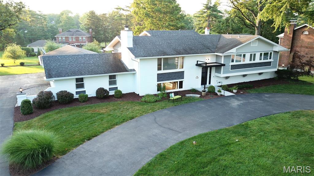 Price Improvement! Spectacular 4+ bedroom, 3 1/2 bath home in Town & Country offering
over 3800 sq ft of living space with a park-like setting. Cook’s dream kitchen
featuring a huge center island with bar seating & prep sink, granite counter tops,
2 pantries, coffered ceiling & stainless appliances including a new double oven.
Open, airy & naturally lit main living also includes dining room & vaulted
living room with hardwood floors throughout. Escape to large primary bedroom with gas
fireplace and walk in closet. Ensuite spa-like bathroom with soaking tub, tile
shower with rain head and seat; separate his/her floating vanities, toilet room and
laundry. Second bedroom with full hall bath. Newly renovated lower level great
for entertaining includes electric fireplace, 1/2 bath and bar with LPV flooring. Two
additional bedrooms (possible pool or workout room) with dual access full bath
and laundry hookup. Large finished bonus room for possible 5th bedroom or hobby
room. Access luxury salt water PebbleTec pool with all new pool equipment off
new upper Trex deck or LL concrete patio. Pool area is fenced and large flat
additional yard; 2/3+ acres. Countless more updates including freshly painted
exterior with new entry, professional landscaping, some new gutters and new water heater. 3
car garage. Home offers retreat living that’s close to Bellerive CC, parks, award
winning Parkway and private schools, hospitals, dining and shopping with easy
highway access.