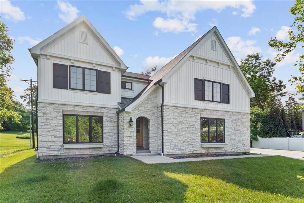 1606 Fawnvalley Dr. is a fabulous opportunity to move right in to a 3-year old home in a premium Des Peres location. Built by Boulevard Custom Homes, this property has a long list of quality features. The main level includes a gorgeous kitchen, with a “double island”, high end appliances and perfect orientation to the large living spaces. The great room showcases big, beautiful windows, boxed beams across the 10’ ceiling, built-in shelving and a gas fireplace.  Hardwood flooring continues through the main floor master bedroom, complete with a luxurious ensuite bath. The second floor offers 3 full baths PLUS a bonus room along with 2 full bathrooms, one a jack-and-jill and the other off the hall. The 1,240 sq. ft. finished lower level brings the total living area to 4,854 sq. ft., with a 5th bedroom, 4th full bathroom, and tons of unfinished storage space. And don’t miss this screened porch! It’s the perfect place to enjoy the privacy of the fenced backyard.