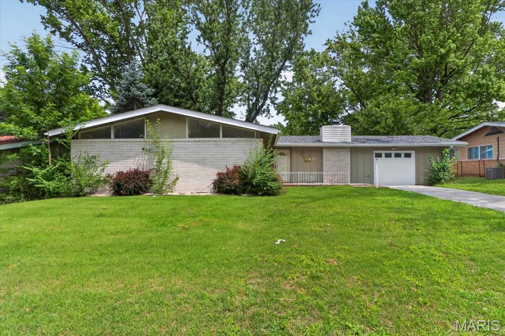 Welcome to this beautifully updated 4-bedroom, 2-bath ranch in the heart of Florissant! This move-in ready home features an open and inviting floor plan with luxury vinyl plank flooring, fresh neutral finishes, and abundant natural light throughout. The spacious living area flows seamlessly into the updated kitchen complete with white cabinetry, stainless steel appliances, and ample counter space. Enjoy generously sized bedrooms, a stylishly renovated bath, and the peace of mind that comes with newer mechanical systems. Outside, you'll find a large backyard offering plenty of space for entertaining, gardening, or relaxing. Conveniently located near parks, shopping, dining, and major highways. Don't miss this fantastic opportunity to own a well-maintained, updated home that's ready for its next owner! Bring all offers.