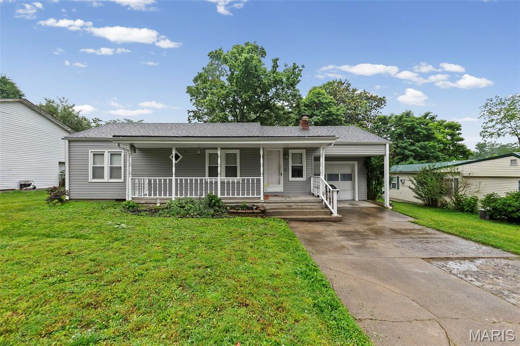 Move right into this charming 3 bed, 2 bath home on a quiet street! Fresh paint throughout, an adorable kitchen, and a completely updated main level bathroom make this home feel warm, fresh, and move in ready. You'll love the sunroom, perfect for plants, pets, or a cozy morning coffee spot. Outside, enjoy a large fenced backyard with plenty of room to play, garden, or entertain. Affordable, centrally located, and ready for its next owner!