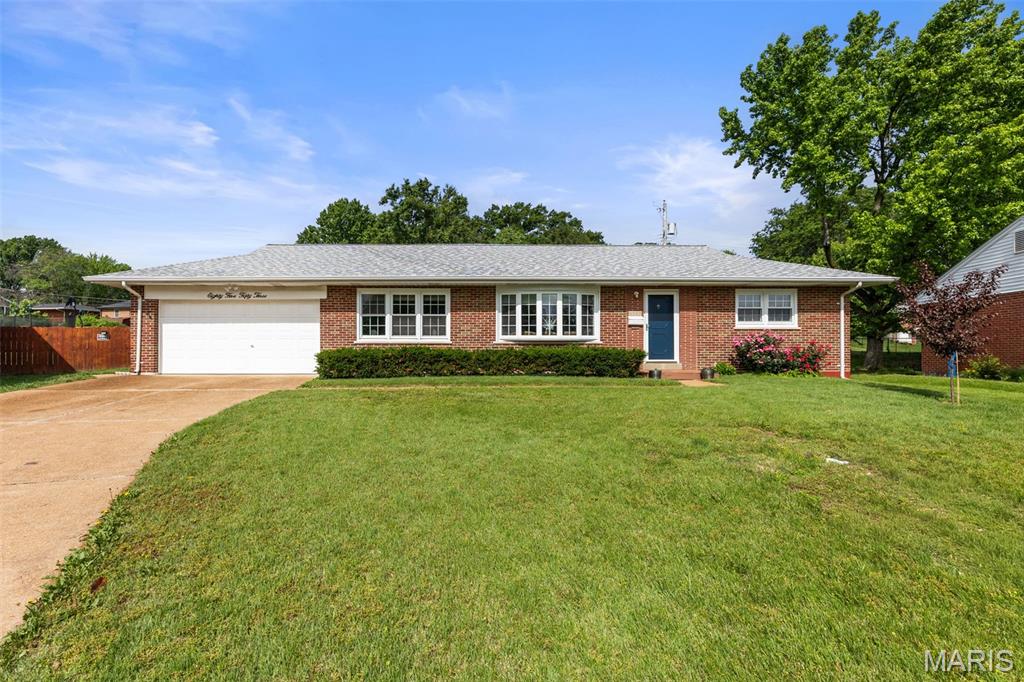 Circa 1960 With over $25K of improvements in the last year, plus a thoughtful refinish in 2024, this buttoned up brick home in the Affton school district offers a solid investment & peace of mind from the moment you open the front door. With a new architectural shingles on roof above to the systems below, including a new sewer lateral, water heater, furnace & outdoor condenser, the big ticket items have been addressed making for high efficiency & a worry-free life ahead. A welcoming living room boasts a beautiful bay window, motorized custom shades & hardwood floors that flow naturally to the oversized dining room with easy access to garage & enclosed porch & yard space outback. Brand new appliances. New stainless appliances are the jewels of the adequate kitchen. Down the hall you’ll find full size closet in the primary & other bedrooms. Plus the original mid-century tile with glass block windows is intact. Added storage in the hallway coat and linen closets are a bonus to boot. Through the oversized two car garage with ample room for tools & toys is the stairwell to the fully finished lower level. A playroom/media room/Zenden await. A true sleeping quarters/guest area & even a  large open space for workshop or studio maximize function, The separate laundry room has storage & enamel sink. Nearby the  magnificent systems are tucked away in the utility room. Outdoors, lush landscaping & lawns surround the home. Proximity to amenities, services, schools & dining options nearby add to the conveniences of living & location in this nook of Richmond Gardens.