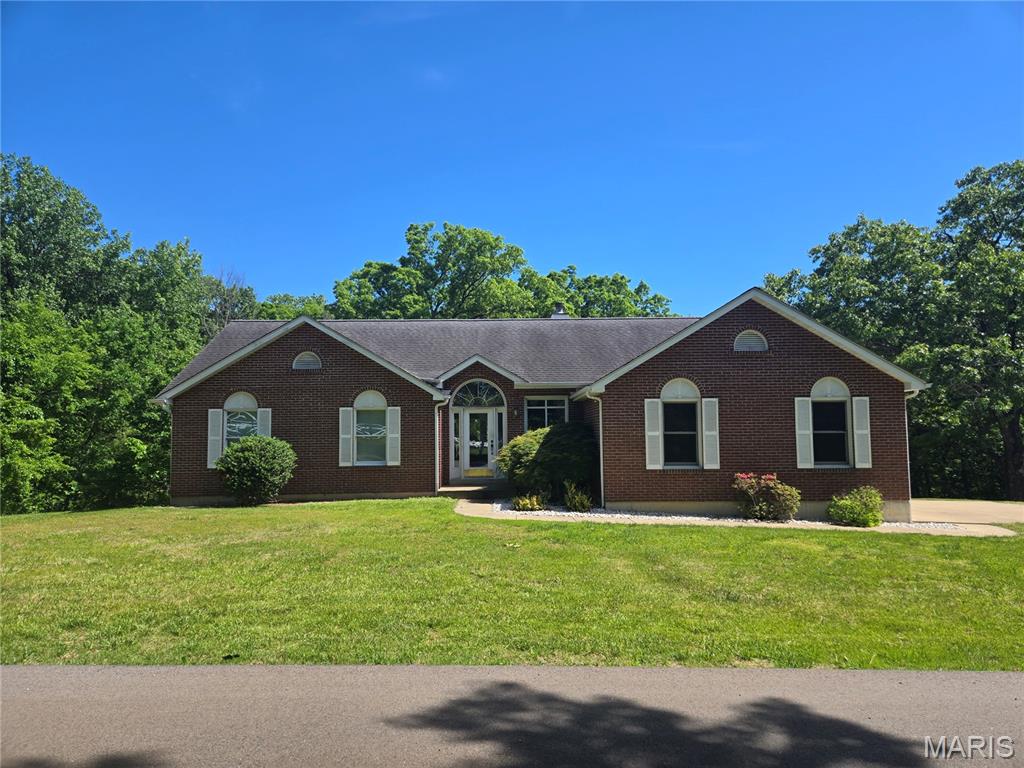 One Owner home on 3.46 acres near State Park was built with quality throughout!  Home has formal dining area, vaults in kitchen and living rooms plus a fireplace-Wall of windows-main floor laundry-french doors to vaulted master bdrm with bay window plus luxury bath with garden tub, shower, and dual sinks-deck out back overlooking woods-finished walkout basement with huge family room, 1/2 bath and possible 4th bedroom(has window but no closet)-home needs some new paint and flooring but would be a show place once completed-minimal restrictions attached to MLS-county water-call today