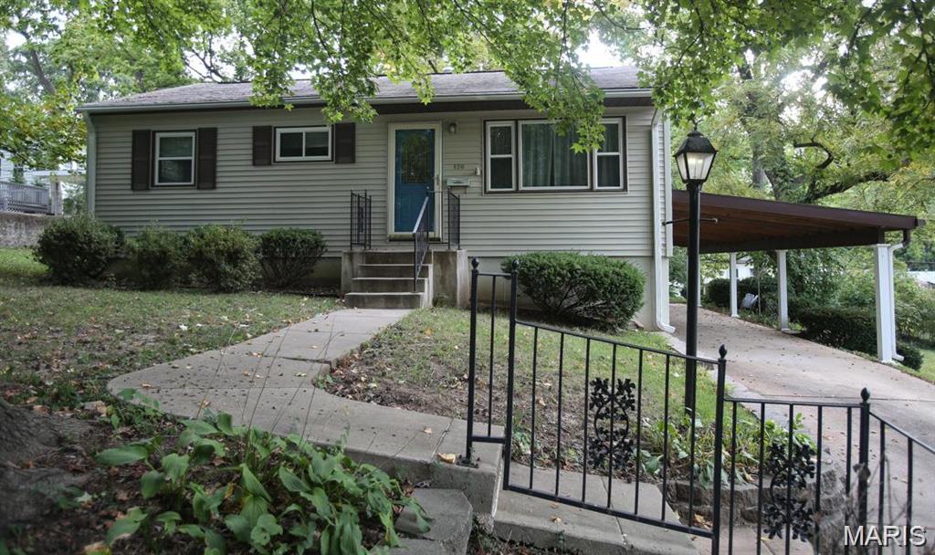 Just minutes from the heart of Old Webster Groves. A quality addition expanded the living space with a spacious family room, second full bath, and main-floor laundry option. 
The eat-in kitchen features ample workspace, a large pantry, stainless steel appliances, and a gas range.
The tall basement offers additional finishing potential, while the tandem carport provides covered parking and doubles as a great outdoor entertaining space. Solid construction, thoughtful updates, and an excellent Webster Groves location!