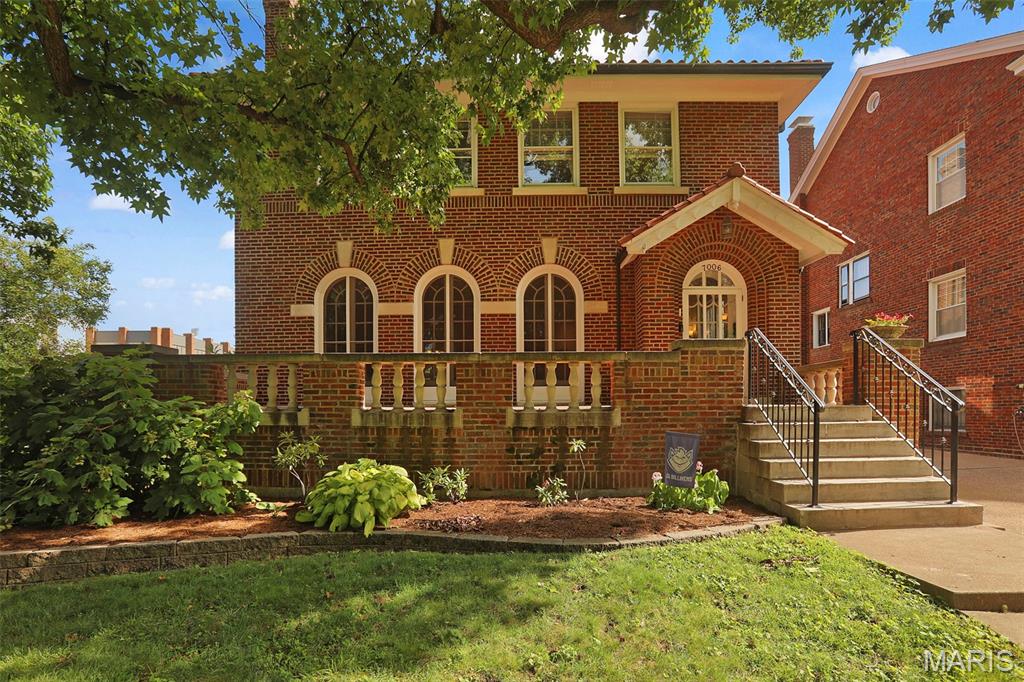 This 1923 Italian Renaissance Revival residence hallmarks a formal brick terrace with stone balusters, clay tile roof and three soaring full-height, arched French doors that bridge the living space to the formal front terrace.  The details: 3246 S.F., +311 S.F. three-season enclosed patio room; 6 bedrooms, 3 full baths, 1 half bath; rare double lot featuring a detached 2 car garage, rear parking pad and a secondary side driveway.  While the historic integrity of the home has been preserved - including the 7x 9 entry foyer - the updated kitchen is a chef's delight offering a breakfast bar, stainless appliances and plenty of storage space.  The second floor layout provides ultimate flexibility.  Many options for a large primary bedroom, guest suites, and multiple dedication home offices. Newer HVAC is hot water heat with zoned forced air conditioning.