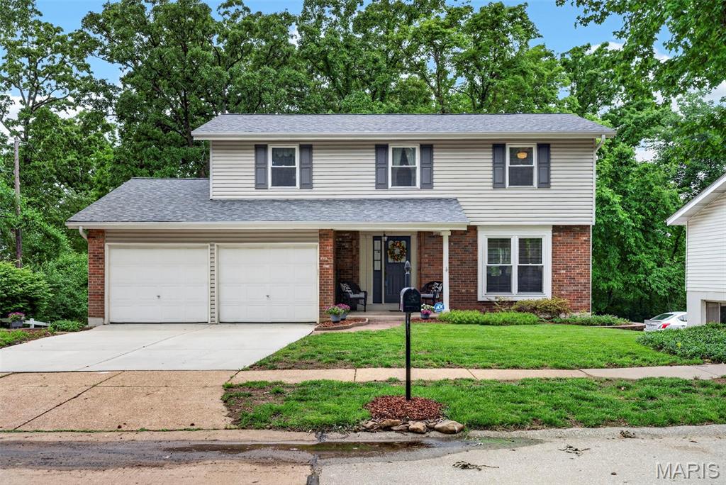 Showings to begin Wednesday, May 27! Tucked away on a quiet cul-de-sac in the sought-after Parkway School District, this impeccably maintained home offers extra space and functionality. With one of the larger floor plans in the neighborhood, there’s room to spread out, gather together, and settle in comfortably for years to come. Warm hardwood floors flow throughout the home, while the beautifully updated kitchen features custom cabinetry, under-cabinet lighting, stainless steel appliances, and an easy connection to the main living spaces. The inviting Family Room is centered around a cozy gas fireplace, creating a welcoming place to relax at the end of the day. Step outside to a composite deck overlooking a wooded area, perfect for morning coffee, quiet evenings, or entertaining guests. Conveniently located near highways, shopping, dining, and parks, this home blends comfort, convenience, and timeless appeal in an exceptional setting.