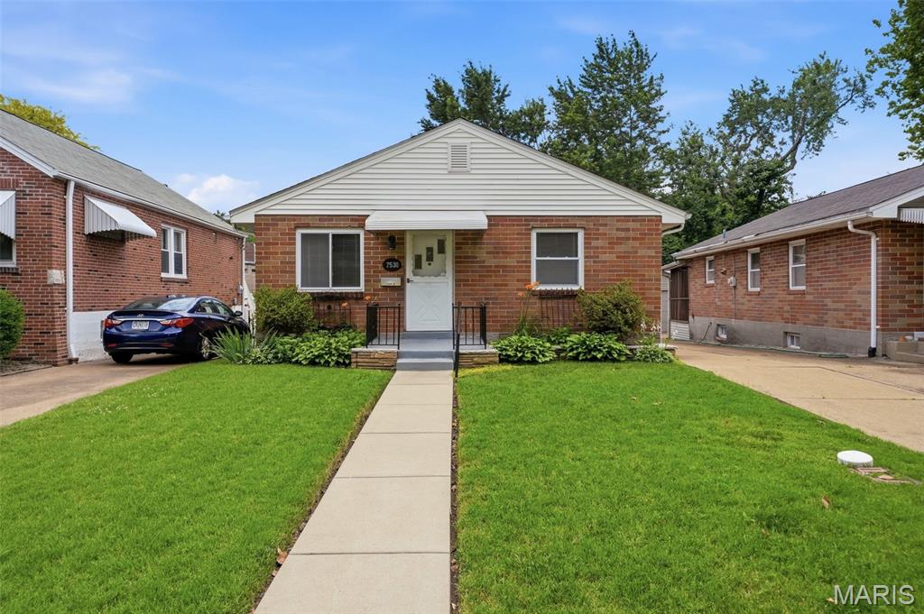 Charming brick bungalow offering a wonderful value! From the moment you arrive, you'll appreciate the inviting curb appeal and attractive exterior. Inside, beautiful hardwood floors flow throughout much of the main living area, creating a warm and welcoming atmosphere.
The bright living room is filled with natural light and provides a comfortable space for everyday living and entertaining. The spacious kitchen offers ample cabinet and countertop space, making meal preparation and gathering with family and friends easy and enjoyable. Just off the rear of the home, the sunroom provides additional living space that can serve as a sitting area, home office, hobby room, or flex space to fit your needs.
This home features two comfortable bedrooms and a full bathroom on the main level. Step outside to enjoy the covered deck, perfect for morning coffee, outdoor dining, or relaxing while overlooking the backyard. The oversized detached garage offers excellent storage, workshop potential, and plenty of room for parking.
The full basement is clean, dry, and unfinished, providing abundant storage space as well as an opportunity for future expansion, recreation space, a home gym, or additional living area. A brand-new roof installed in 2026 adds peace of mind and long-term value.
Conveniently located near parks, schools, shopping, restaurants, and major commuter routes, this property offers easy access to all the amenities the area has to offer. Whether you're a first-time homebuyer, downsizing, or looking for a move-in-ready home with room to grow, this property presents an exceptional opportunity. Don't miss your chance to make it yours!