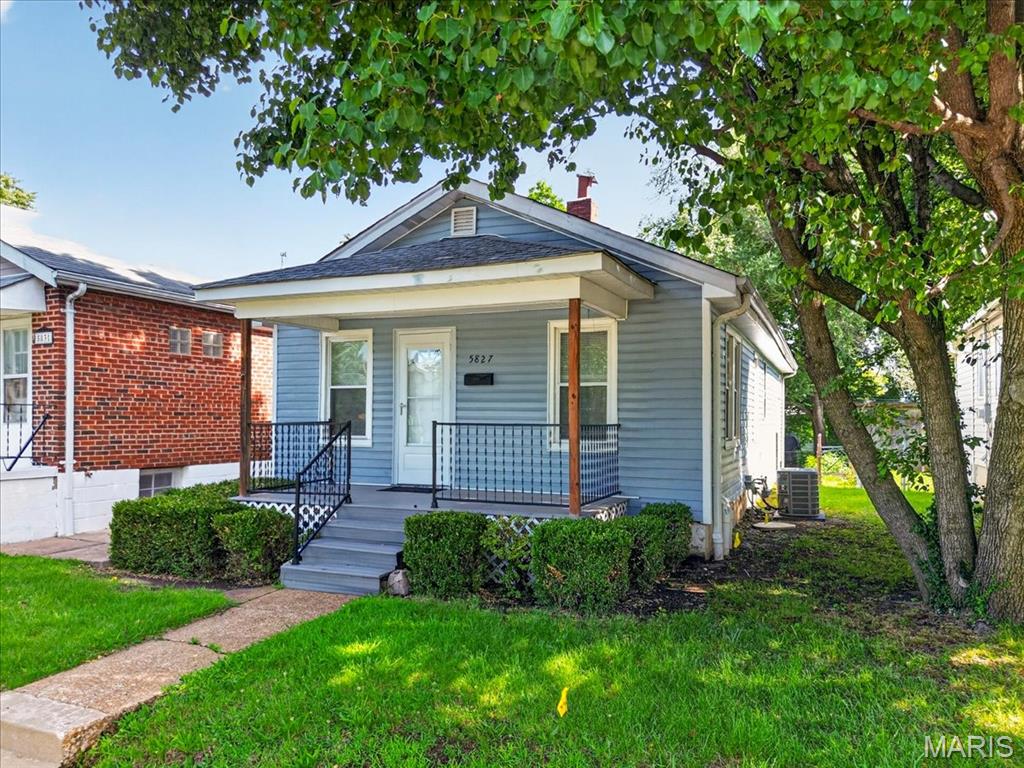Don't miss this move in ready two-bedroom bungalow with all the best of city living. Located within walking distance to Dogtown dinning the Zoo and Forest Park. Have a morning coffee and relax on the covered front porch.  This home has an updated kitchen with stainless steel appliances, high efficiency HVAC just installed in 2026, luxury vinyl plank flooring, off street parking and rear ally access, thermal insulated windows, low maintenance vinyl siding, updated electric.