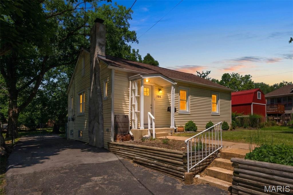 Adorable, Move-In Ready Home W/ Outdoor Oasis. Charming one-story ranch in Overland on a spacious .3-acre lot — larger than most in the area! This 2 bed/1 bath home is loaded with updates: a 2-year-old water heater, newer electric panel, newer vinyl tilt-in windows, and a sewer lateral replaced to the city main in 2020. The kitchen cabinets were recently professionally finished; the kitchen also features a new tile floor, all the walls/trim/doors have been professionally painted, and you will find vintage cedar shelving in the bedroom. Just move in and enjoy! The fully fenced backyard is your private retreat, featuring a deck and an insulated storage shed. The walkout basement adds flexible living or storage space. Portable dishwasher included. Fireplace sold as-is. This property qualifies for the Barnes Jewish Live Near Your Work Program — a fantastic benefit for eligible buyers! This sharp-looking home is a must-see!