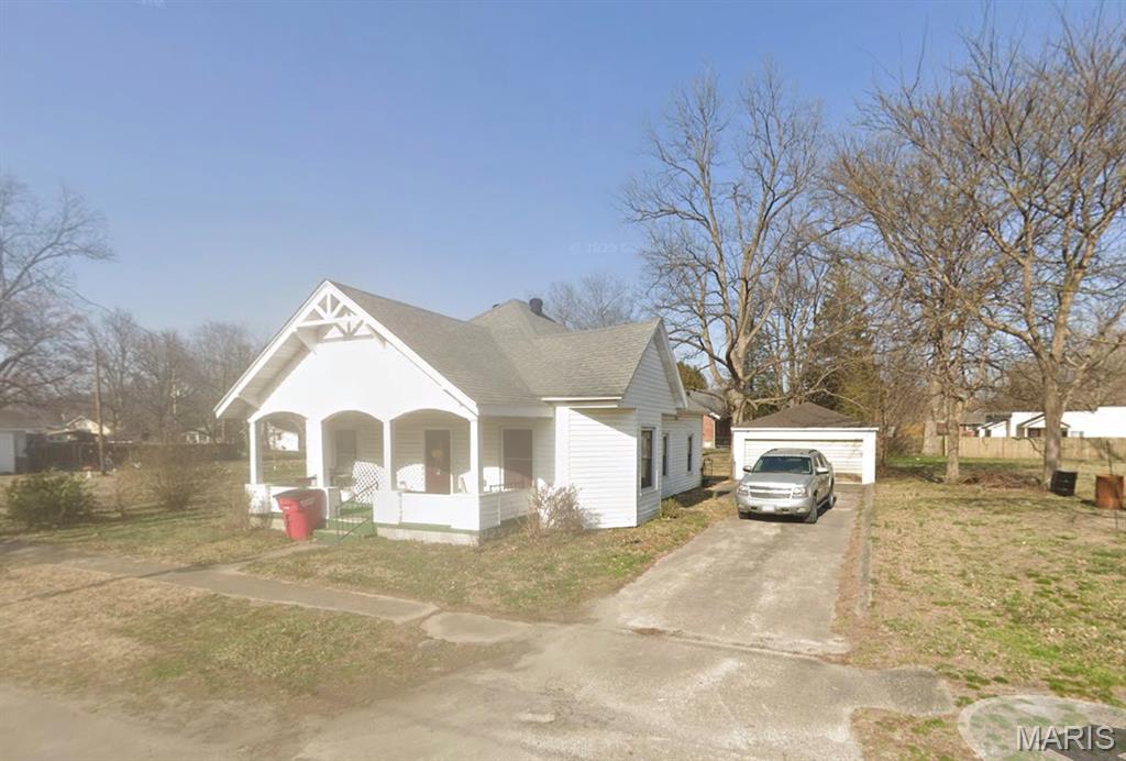 Step into a piece of Oran history with this charming and thoughtfully updated 3-bedroom, 1-bath home situated on a spacious 0.26-acre lot in the heart of town. Originally built in 1912, this home beautifully blends timeless character with modern-day updates, making it move-in ready while preserving the craftsmanship and charm that older homes are known for.
Offering 1,050 square feet of living space on the main level, you'll immediately appreciate the original hardwood floors that showcase the home's history and warmth. The spacious living room, dedicated dining area, and functional kitchen create a comfortable layout for everyday living and entertaining. The kitchen features a gas stove, perfect for those who enjoy cooking with precise temperature control.
Major improvements have already been completed, giving buyers peace of mind for years to come. The home has been rewired and updated to a modern breaker panel, along with new windows and sheetrock through the entire home and a new roof installed in 2015. Additional updates include a new HVAC system and garage roof in 2020, as well as a new gas water heater in 2024.
The home features three main-level bedrooms and a full bathroom with marble flooring. A partial unfinished basement provides additional storage space, while the detached 2-car garage offers room for vehicles, tools, hobbies, or workshop space. The level backyard provides plenty of room for outdoor activities, gardening, pets, or simply enjoying the peaceful small-town setting.
Located within the Oran R-III School District, this property offers the best of small-town living with convenient access to local schools, parks, churches, and community events. Oran is known for its welcoming atmosphere, strong community pride, and easy access to nearby Cape Girardeau and Sikeston, making it an attractive option for those seeking a quieter pace of life while remaining connected to larger city amenities.
Whether you're a first-time homebuyer, looking to downsize, or searching for a well-maintained home with significant updates already completed, 108 Elm Street deserves a spot on your must-see list.

?? Property is currently occupied. Showings begin July 6, 2026, and are available by appointment only. Pets are on the property, and appointments are required. ?? 

Don't wait—homes with this combination of character, updates, and affordability don't come along often. Contact me today to schedule your private showing when this home officially hits the market on July 6!