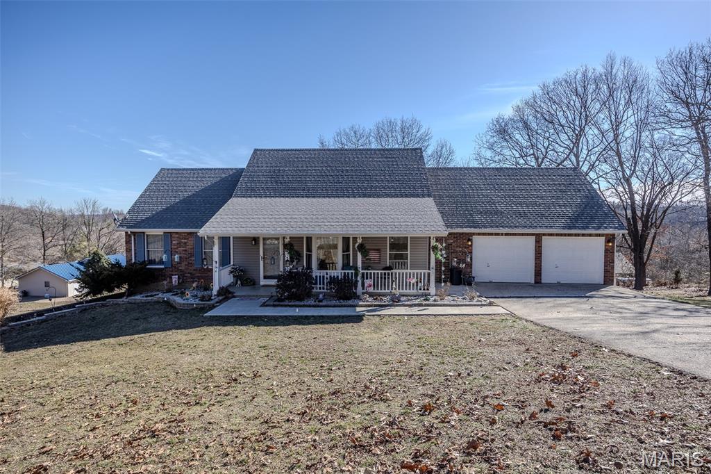 Stunning 4 Bedroom | 3.5 Bath Home in West Waynesville – Designer Finishes Throughout

Welcome to refined living in one of West Waynesville’s most desirable and quiet neighborhoods. This beautifully renovated 4 bedroom, 3.5 bath home offers the perfect blend of thoughtful design, functionality, and elevated finishes throughout.

From the moment you step inside, you’re greeted with a flowing open-concept layout and a carefully curated interior design palette that creates warmth and cohesion from room to room. The main level features spacious living areas, updated flooring, fresh paint, custom cabinetry and millwork, quartz countertops, and a stunning mosaic backsplash that anchors the kitchen with style and main level laundry.

The formal living room offers a cozy fireplace, creating the perfect space to unwind or entertain. The main-floor primary suite feels like a private retreat with cathedral ceilings, a beautifully appointed en suite bath, and a generous walk-in closet.

Major mechanical updates completed in 2022, including updated HVAC, water heater, and water softener systems.

Downstairs, the walk-out basement expands your living space with a large family room, an additional bedroom, full bathroom, and a flexible area ideal for a home office, gym, or guest suite, complete with its own separate entrance for added versatility.

Step outside to enjoy the fully fenced backyard, perfect for pets, play, or entertaining.

Conveniently located near schools, shopping, and just minutes from Fort Leonard Wood, this home offers both luxury and lifestyle in one beautifully finished package.

If you’ve been waiting for something that truly feels move-in ready and thoughtfully designed, this is it.