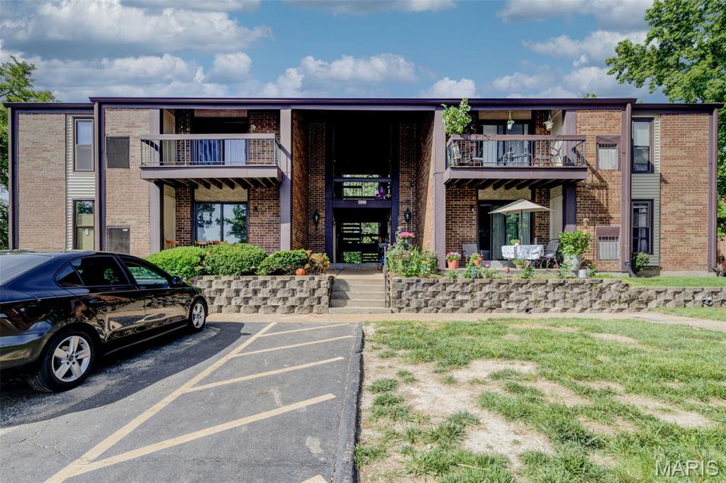 Welcome Home! Fully updated since purchased, This move-in ready condo features 2 spacious bedrooms, an updated bathroom, full kitchen, separate dining room, and an open living area. Did I mention the balcony? In the basement, you'll find free washer and dryer amenities as well as a designated private storage room. Within the community are basketball courts, a clubhouse, and a beautiful in-ground pool, perfect for your upcoming summer gatherings. 1 parking spot included with several guest parking spots available. Brand new carpet just installed in bedrooms! Conveniently located just off HWY 55, you have quick access to enjoy the rest of south county or the city.