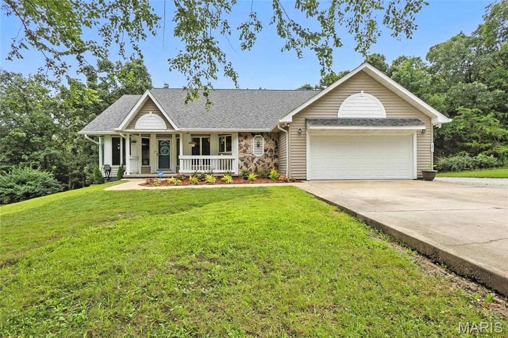 ***NEW PRICE!!!*** Welcome to this stunning Ranch home nestled on 10.06+/- acres of picturesque countryside, complete w/ trails & two charming wet-weather creeks—perfect for nature lovers, outdoor adventurers, or anyone craving peace & privacy.
As you step inside, you're greeted by Soaring ceilings, rich flooring, & an open, inviting layout. The kitchen offers granite countertops, a double sink, & an oversized walk-in pantry—ideal for the home chef! The Living room features a cozy wood burning fireplace & opens to a massive deck that spans the back of the home, offering breathtaking views of your land. The primary suite has direct deck access—just imagine sipping your morning coffee or watching wildlife at sunset from your private retreat.  2 additional bedrooms & a full bath are thoughtfully placed on the opposite side of the home for privacy. Head downstairs to find even more living space, including 2 bonus rooms perfect for sleeping areas, home offices, or hobby rooms, plus another full bathroom. But that’s not all—the ultimate "man cave" awaits, offering a perfect place to unwind after a day outdoors, w/ convenient access to a spacious workshop.  Whether you're looking to hunt, hike, or simply relax in nature, this home gives you the best of both worlds; seclusion, highway Convenience!  Don’t miss this opportunity to own your very own slice of paradise!  Home Warranty, Google Nest, NEW Roof, Gutters & Downspouts. ADT Security system & whole home water filter.
