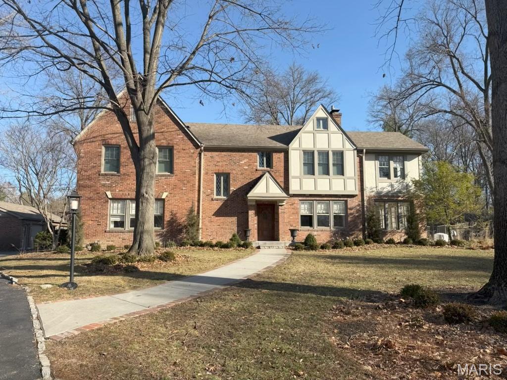 An exceptional 5-bedroom, 5-bath residence set on a secluded 1-acre lot in one of Ladue’s most coveted and charming neighborhoods. A dramatic foyer adorned with stained-glass windows creates an unforgettable first impression, opening to an elegant dining room showcasing exquisite millwork and a sun-drenched living room with custom built-ins, a wood-burning fireplace, and French doors that lead to a serene sunroom.The beautifully updated kitchen is a true chef’s retreat, featuring a generous center island, top of the line appliances, custom cabinetry and countertops, and a wet bar. The kitchen flows seamlessly into the inviting hearth room, all overlooking the private backyard oasis with pool—ideal for both refined entertaining and everyday luxury living.
The second floor is anchored by a sophisticated primary suite offering a spa-like bath with soaking tub and separate shower, along with a professionally designed walk-in closet. Three additional well-appointed bedrooms complete this level, including one en suite and two connected by a Jack-and-Jill bath, along with the convenience of a second-floor laundry. The third floor provides an additional bedroom and full bath, perfect for guests, a private office, or a secluded retreat.The lower level features a spacious recreation area, dry bar, and abundant storage. Outdoors, the property is enhanced by a detached three-car garage, a stunning pool with stone decking, lush landscaping, landscape lighting, and an irrigation system—creating a private, resort-like setting.
This remarkable home offers timeless architectural character, modern updates, and exceptional privacy in a truly distinguished Ladue location