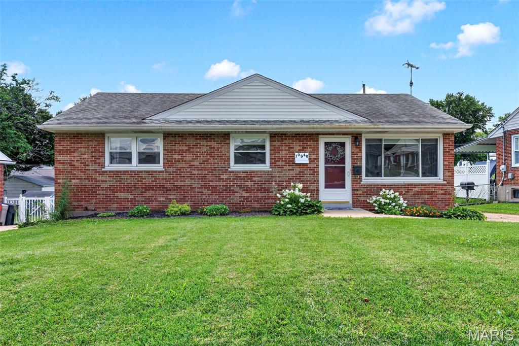 An exceptional value in the award-winning Lindbergh School District! This classic brick ranch offers the perfect combination of updates, everyday comfort, and central South County location. Featuring 3 bedrooms, 2 full baths, and over 1,450 total square feet of living space, this move-in ready home is an outstanding opportunity for buyers looking to get into one of the areas most desirable school districts. Fresh paint gives the home a bright, modern feel, while the remodeled kitchen shines with soft-close wood cabinetry, quartz counters, timeless tile backsplash, stainless steel appliances, and generous storage.  A combination of wood and new luxury vinyl plank flooring flows throughout the home. Vinyl tilt-in double-pane windows with cordless blinds, includes a large picture window filling the front living room with natural light. The finished lower level expands your living space with a good sized family room with wet bar—perfect space for entertaining or relaxing, along with a second full bath.  The generous sized storage room offers built-in shelves, workbench, and laundry.  Step outside to enjoy the fenced backyard featuring a covered deck, extended patio for weekend BBQ's, and a storage shed w/electric for your outdoor tools.  Added attic insulation enhances efficiency inside. While the built-in Murphy bed in the back bedroom provides flexibility to utilize as an office or playroom while still accommodating guests. Walking distance to Officer Blake Snyder Memorial Park, Grants Trail, & Dressel Elementary. Kitchen refrigerator, washer/dryer, & pergola are included in the sale.  In addition, seller is providing a one-year home protection plan for added peace of mind. This one is ready to welcome you Home!!