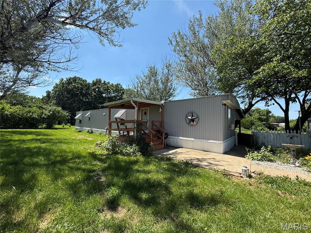 Opportunity awaits at Valley Lake Estates! This 2-bedroom, 1-bath manufactured home sits on approximately 2.89 acres and offers a peaceful, private setting with plenty of potential.
The property features a detached 2-car garage with an enclosed storage area, a large back patio with attached covered porch, and a beautiful yard. 
The home will require repairs and updates, including roof repairs (currently not leaking) and replacement of the forced-air heating unit. Being sold in as-is condition, this property is ideal for an investor, handyman, or buyer looking to create their own retreat.
Enjoy the privacy, acreage, and possibilities this property has to offer!